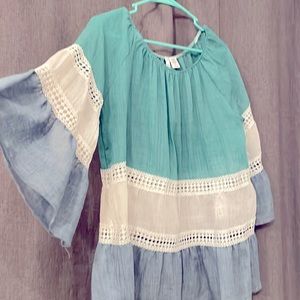 Blouse. Sheer in the white area. Runs large. Size small. New without tags